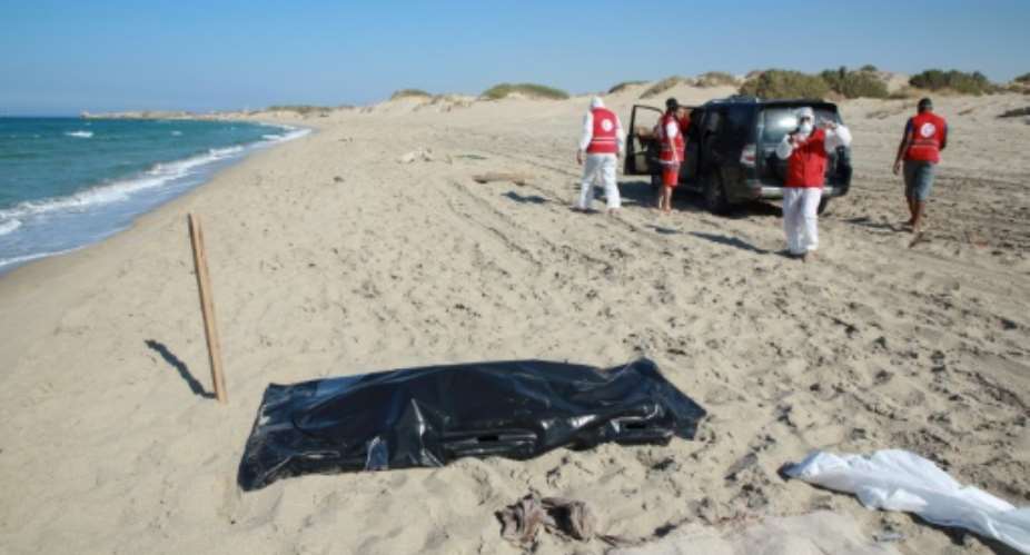 Members of the Libyan Red Crescent have been recovering the bodies.  By - AFPFile