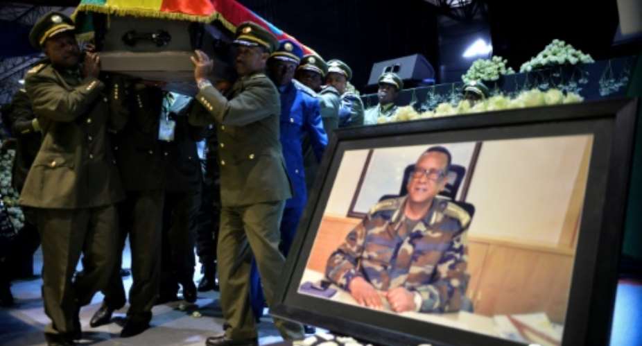 Members of the public and the military gathered in Addis Ababa on Monday for ceremonies to honour slain armed forces chief Seare Mekonnen.  By Michael TEWELDE AFP
