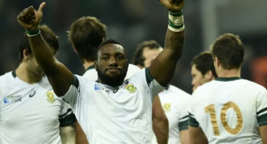 South Africa's prop Tendai 'The Beast' Mtawarira celebrates after winning a Pool B match of the 2015 Rugby World Cup against Scotland at St James' Park in Newcastle-upon-Tyne, north east England on October 3, 2015.  By Lionel Bonaventure AFP