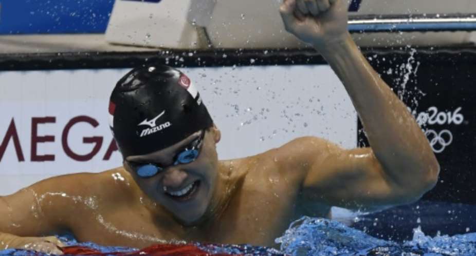 Singapores Joseph Schooling, 21, won the 100m butterfly final in a Games record 50.39sec.  By Christophe Simon (AFP)