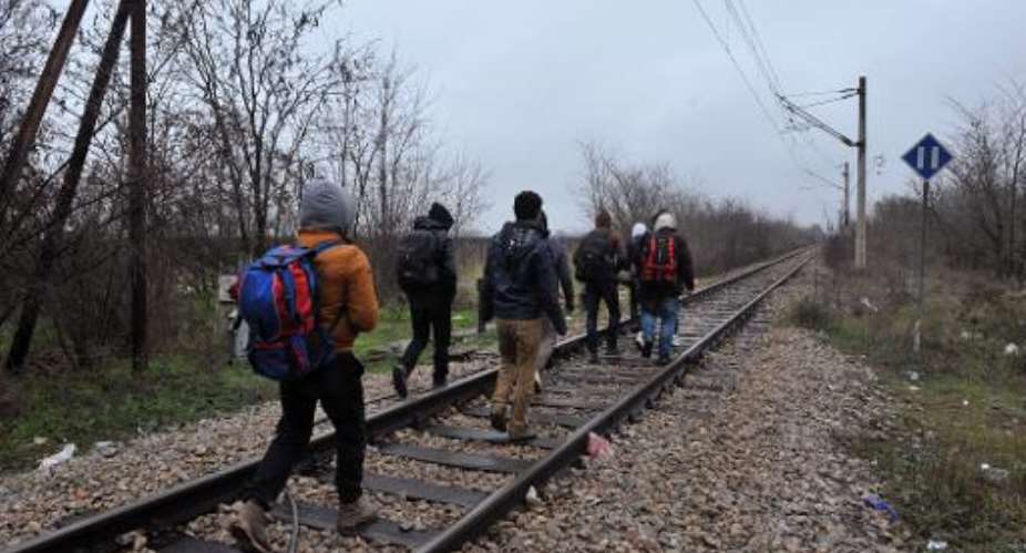 Migrants often walk along the Macedonian and Greek railway lines as they make their way into the European Union.  By Sakis Mitrolidis AFP
