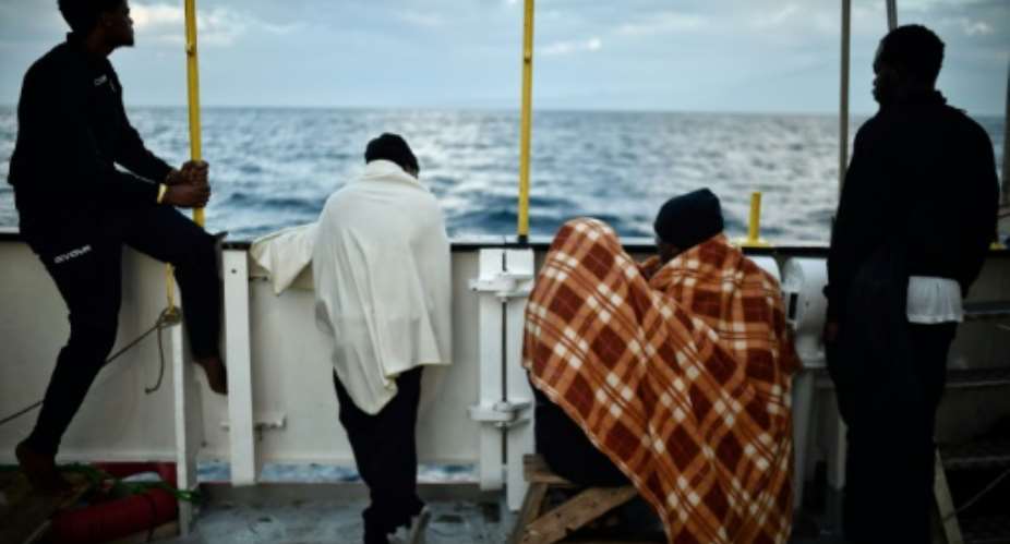 Migrants on board rescue ship MV Aquarius headed for Sicily after dozens were picked up on May 12 by NGO vessels who fear Italian political changes could put even more people at risk.  By LOUISA GOULIAMAKI AFPFile