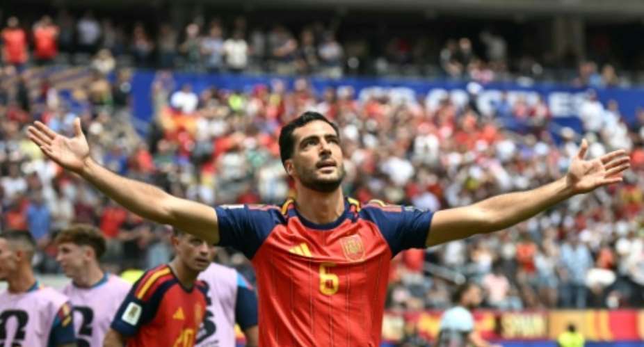 Mikel Merino pounced on a rebound to score the goal that sent Spain into a World Cup semi-final against France.  By Paul ELLIS (AFP)