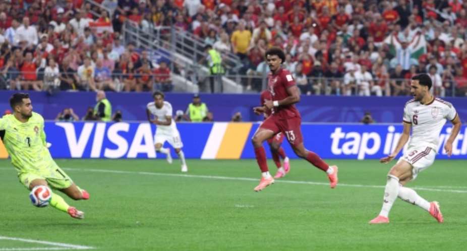 Mikel Merino scores to send Spain into the last eight of the World Cup.  By Thomas COEX (AFP)
