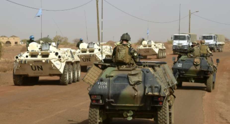 UN and French soldiers patrol near Gao, northern Mali, on May 30, 2015.  By Philippe Desmazes AFPFile