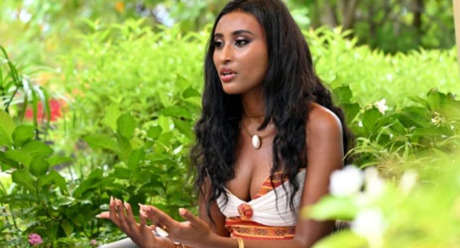 Miss Ethiopia Ruth Weldesilasie sees taking the stage in Vietnam as a way to serve the larger sisterhood of women, even if her own sibling is lost.  By Nhac NGUYEN (AFP)