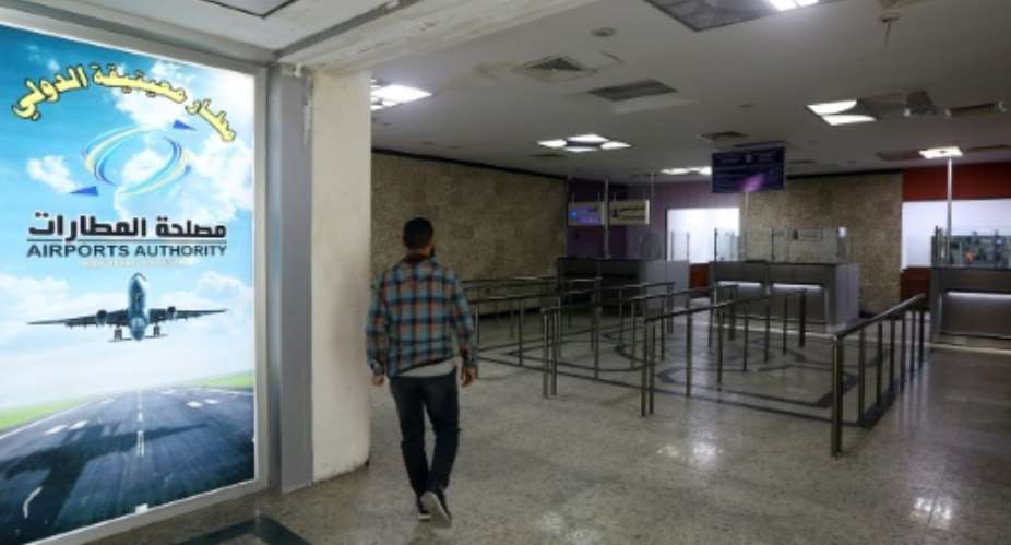 Mitiga International airport was closed to daytime flights after an air strike on April 8.  By Mahmud TURKIA AFP