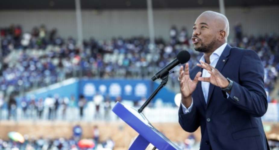Mmusi Maimane, the leader of South Africa's main opposition party, the Democratic Alliance, tells supporters next week's general election is a chance to bring change after 25 years of disappointing ANC rule.  By GIANLUIGI GUERCIA AFP