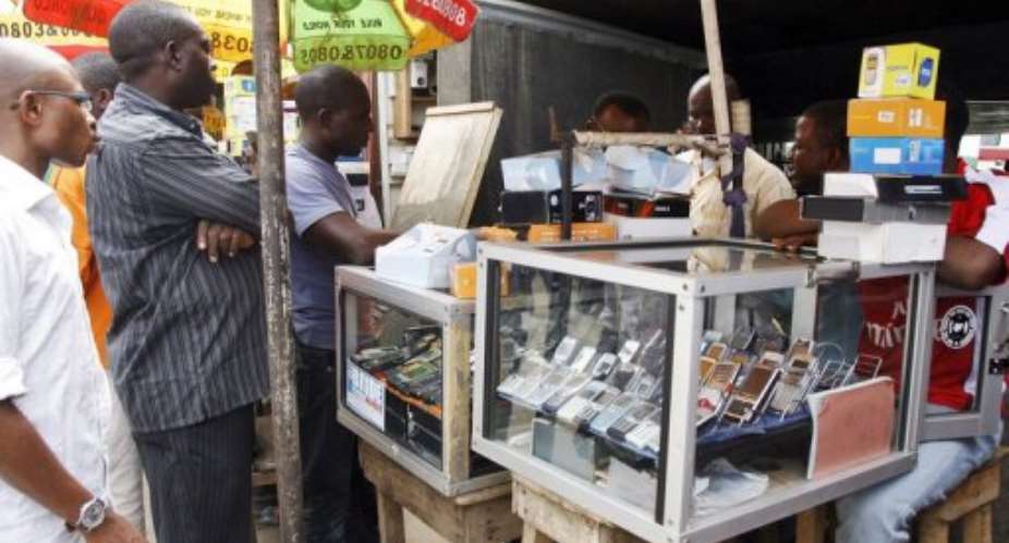 Mobile companies have been thirsting to mimic the success of other African markets.  By Pius Utomi Ekpei (AFP/File)