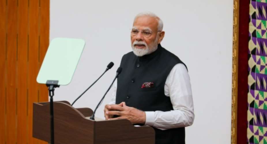 Modi made much of the democratic political system the two countries have in common.  By Nipah Dennis (AFP)