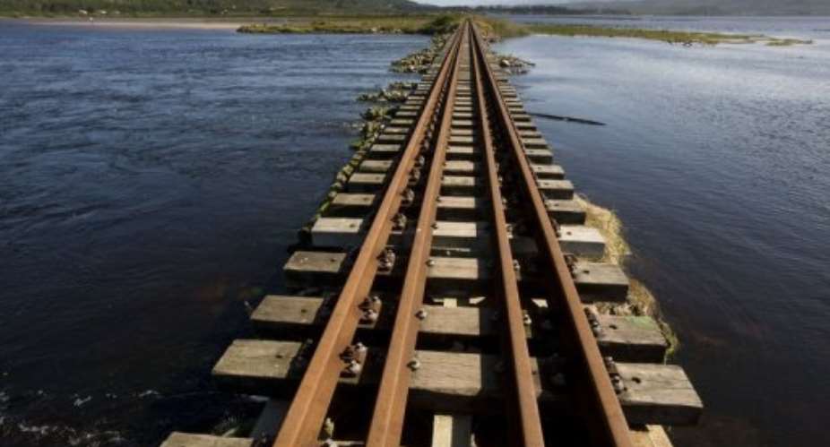 File picture shows a section of railway line at Swartvlei Lagoon close to Knysna, South Africa.  By Rodger Bosch AFPFile