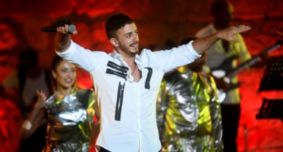 Moroccan activists have launched a social media campaign to ban pop star Saad Lamjarred from the kingdom's radio stations after he was arrested in France last month on a third rape charge.  By FETHI BELAID AFPFile