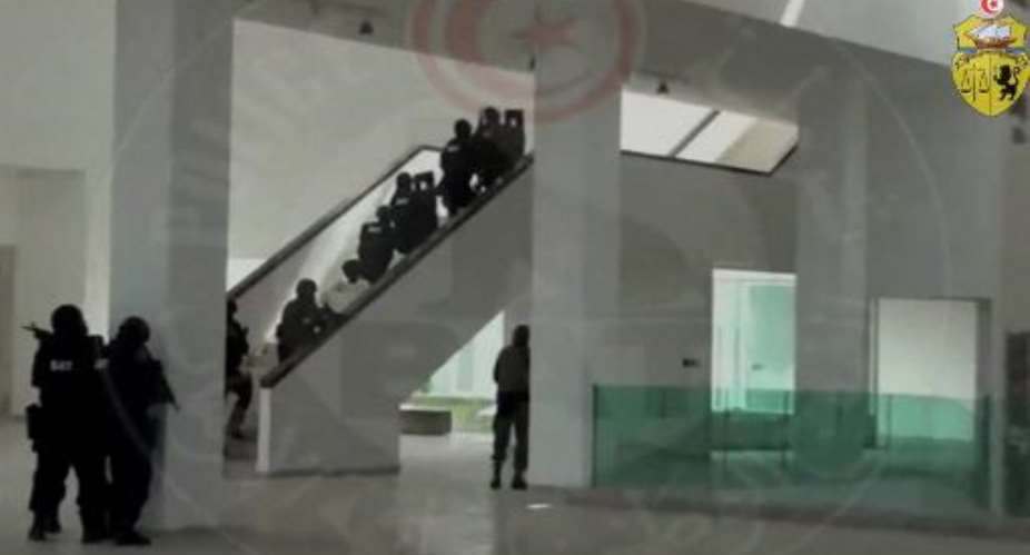 Screen grab from video released by the Tunisian Interior Minister on March 26, 2016 shows Tunisia's anti-terrorism brigade entering the Bardo museum in Tunis during an attack by jihadists at the museum.  By  TUNISIA INTERIOR MINISTERAFPFile