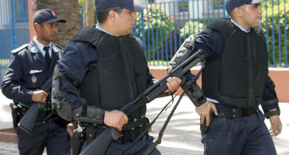 Moroccon police patrol the streets of Casablanca on April 14, 2007.  By Abdelhak Senna AFPFile