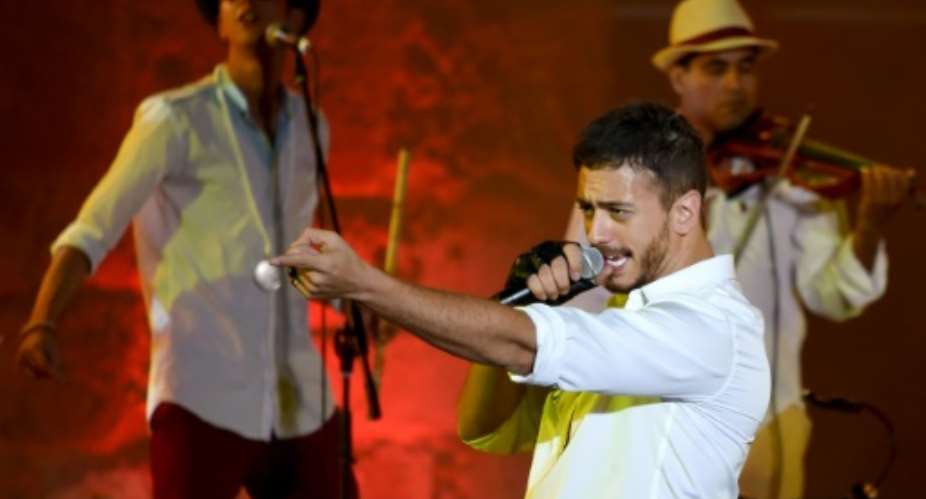 Moroccan singer Saad Lamjarred performs during the 52nd session of the International Carthage Festival in July 2016 at The Roman Theatre of Carthage near Tunis.  By FETHI BELAID AFPFile
