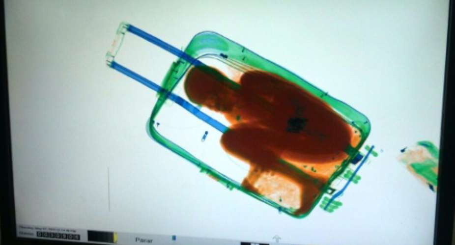An Ivorian child was hidden inside a suitcase as his family tried to smuggle him into Spain in May 2015.  By - AFPFile