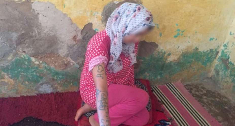 Moroccan teenager Khadija Okkarou showed tattoos that she said were carved into her body by her attackers in a video posted online.  By STRINGER AFPFile