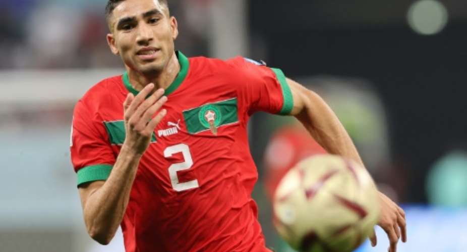 Morocco defender Achraf Hakimi runs for the ball during the 2022 World Cup third place play-off against Croatia in Qatar..  By KARIM JAAFAR AFP