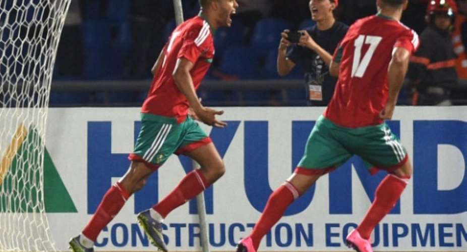 Moroccos El Arrabi Youssef (L) celebrates after scoring a goal during the African Cup of Nations qualifiying football match against Cape Verde, on March 29, 2016.  By Fadel Senna (AFP)