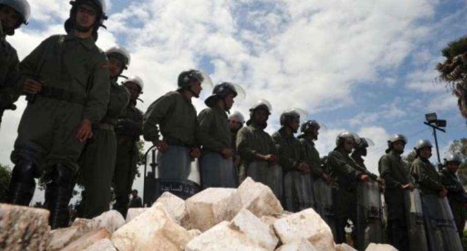 Moroccan security forces stand guard in Rabat.  By Abdelhak Senna (AFP/File)