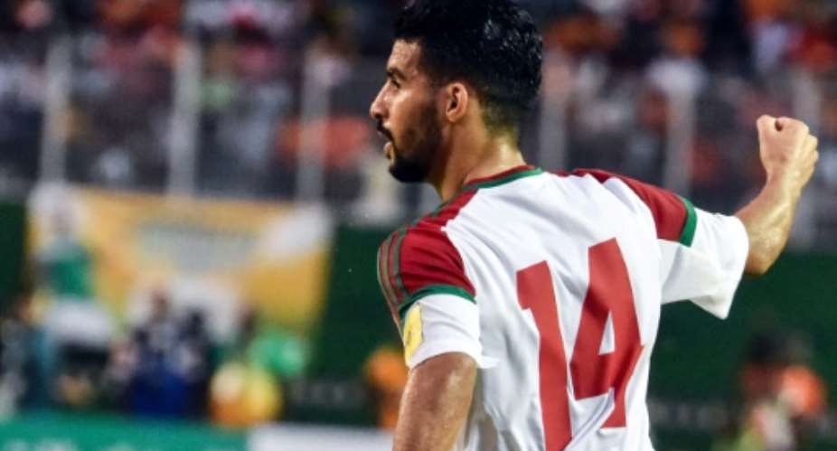 Morocco's Boussoufa Mbark celebrates a goal against Ivory Coast during their FIFA World Cup 2018 Africa Group C qualifying match, at the Felix Houphouet-Boigny stadium in Abidjan, on November 11, 2017.  By ISSOUF SANOGO AFPFile