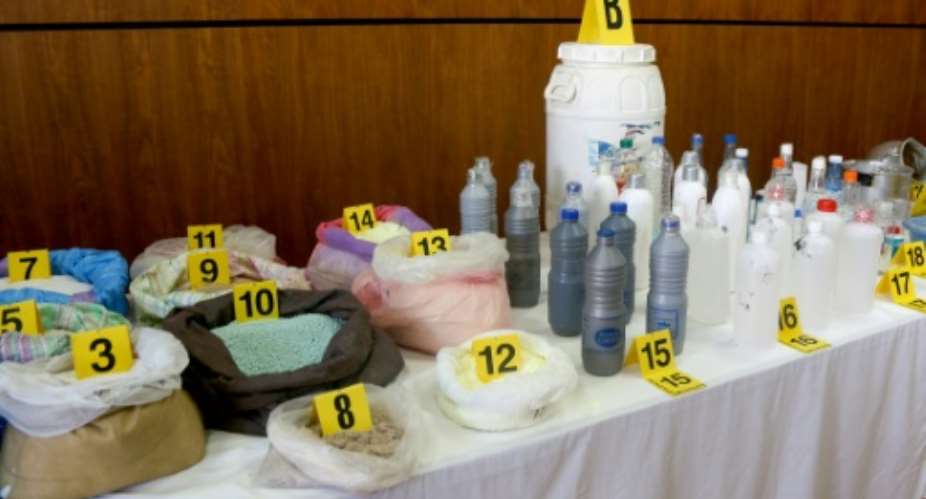 Morocco's Central Bureau of Judicial Investigation BCIJ shows chemicals seized as a result of the dismantling of an Islamic State group-affiliated cell planning suicide bombings.  By - AFP