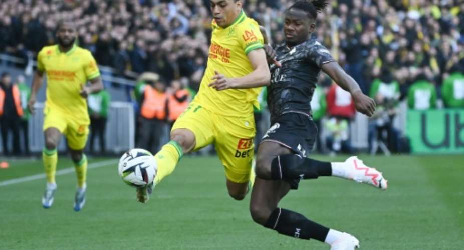 Mostafa Mohamed (L) will sit out Nantes final match of the Ligue 1 season which takes place on the international day against homophobia.  By Sebastien SALOM-GOMIS (AFP)