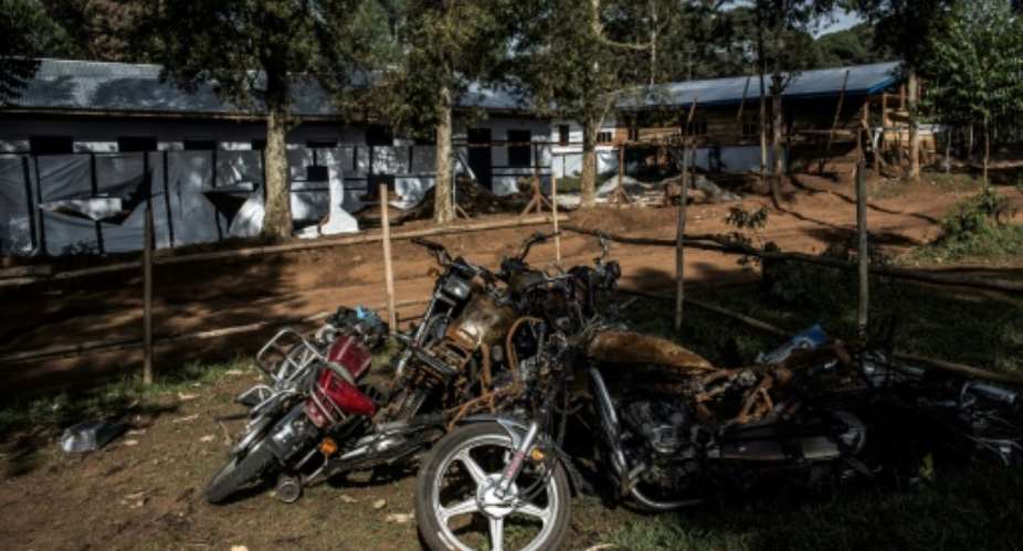 Motorbikes burnt during an attack outside an Ebola treatment centre in Butembo, the epicentre of the  latest outbreak.  By JOHN WESSELS AFPFile