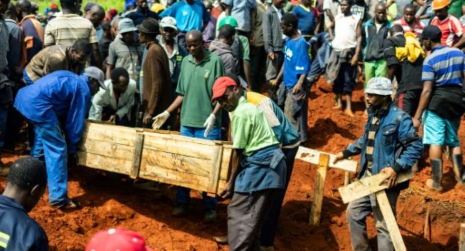 Mourning: Victims of the disaster were given a joint burial on Monday at the local cemetery, Chimanimani Heroes Acre.  By Zinyange AUNTONY AFP