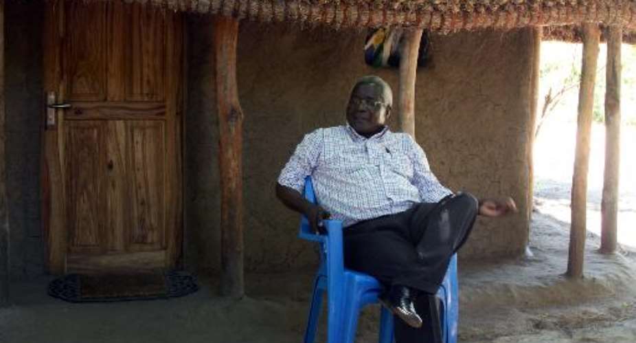 Renamo leader Afonso Dhlakama outside his hut on April 10, 2013 in Gorongosas mountains, Mozambique.  By Jinty Jackson (AFP/File)