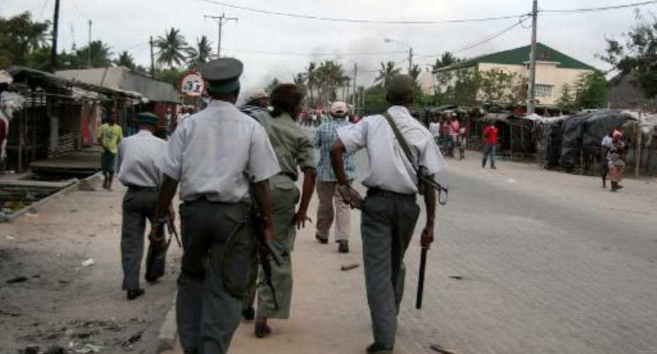 Police patrol on November 16, 2013 in Mozambique's central port city of Beira.  By Maria Celeste Mac'arthur AFPFile