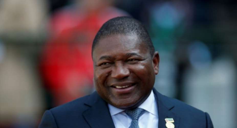 Mozambique's President Filipe Nyusi, pictured in May 2019, held a ceremony with Anadarko executives.  By SIPHIWE SIBEKO POOLAFPFile
