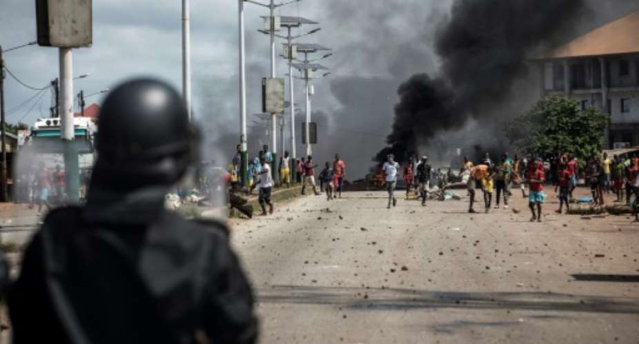 Much of the tension centres on President Alpha Conde's controversial bid for a third term.Security forces repressed mass protests against the move from October last year, killing dozens.  By JOHN WESSELS AFP