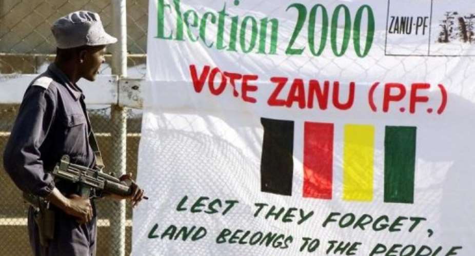 A ZANU-PF poster at a rally in Mutare on June 9, 2000.  By Odd Andersen (AFP)