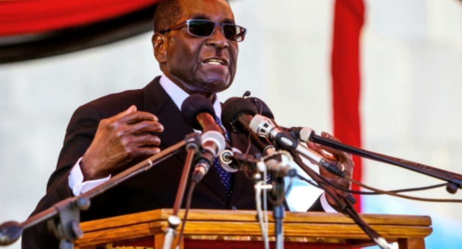 Zimbabwe President Robert Mugabe, pictured in April 2016, speaks during the burial of two national heroines, Victoria Chitepo and Vivian Mwashita, at the National Heroes Acre in Harare.  By Jekesai Njikizana AFPFile