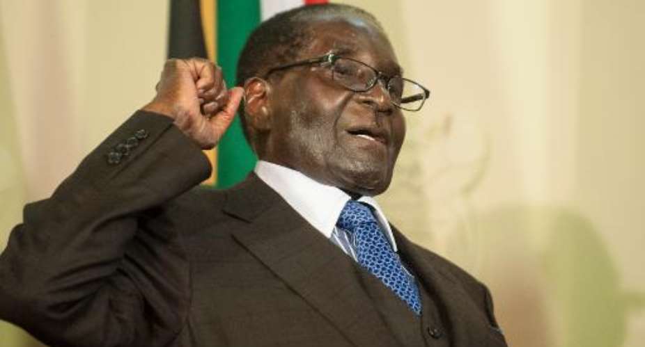 Mugabe lambasts West on visit to S.Africa
