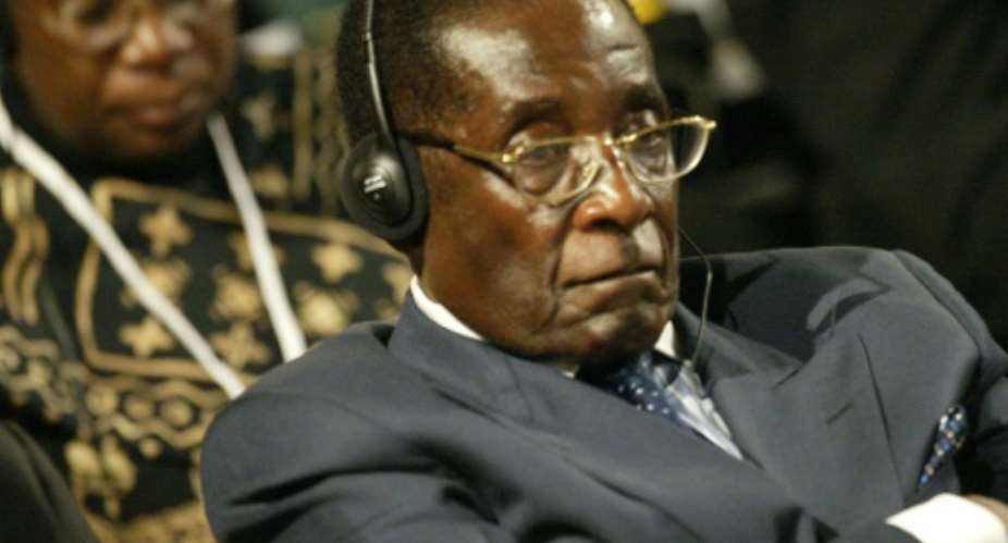 Mugabe pulled Zimbabwe out of the Commonwealth  in 2003 after its membership was suspended over violent and graft-ridden elections the previous year.  By JEAN-PHILIPPE KSIAZEK AFPFile
