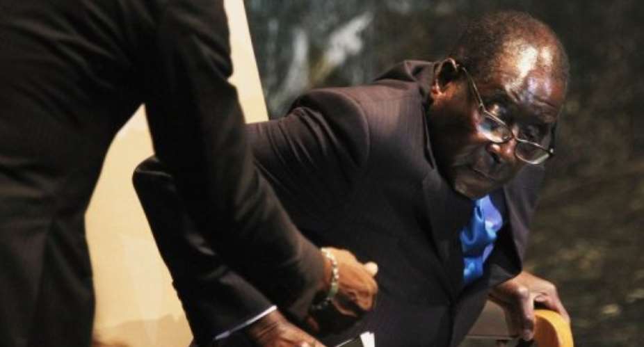 Zimbabwes President Robert Mugabe has denied reports that his health is worsening.  By Mario Tama (AFP/Getty Images)