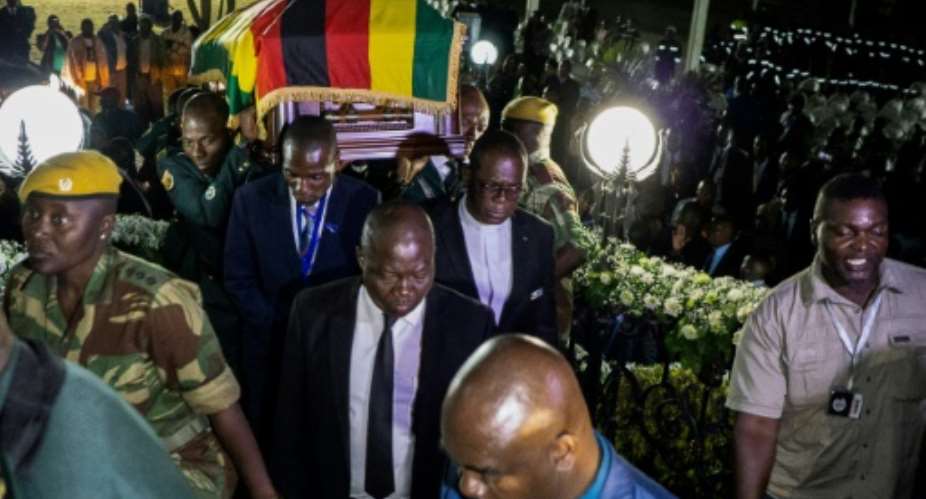 Mugabe's body arrived from Singapore on Wednesday in Harare where he was given an honour guard.  By Zinyange Auntony AFP