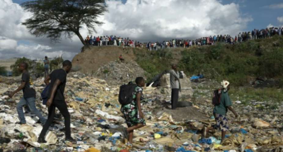 Mulilated female bodies have been hauled from a rubbish tip in a Nairobi slum.  By SIMON MAINA (AFP/File)