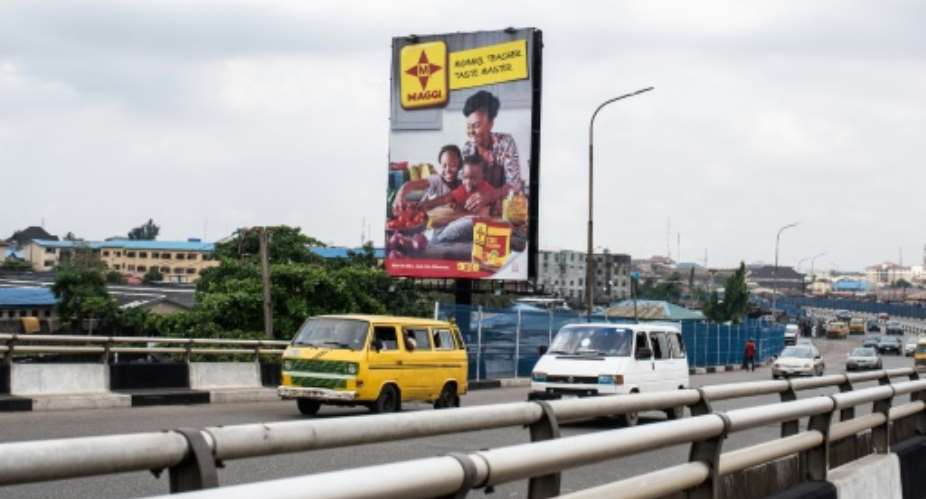 'Mummy. Teacher. Taste Master.' An ad campaign for stock cubes has triggered debate about the role of women in Nigeria.  By - AFP