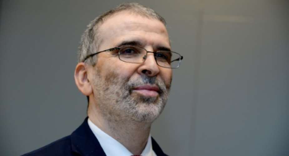 Mustafa Sanalla, Chairman of the National Oil Corporation of Libya, pictured in April 2017, said the company is aiming for 1.25 million barrels per day by the end of 2017.  By ERIC PIERMONT AFPFile