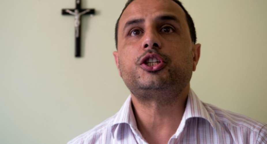 Mustapha, the son of an expert on Islamic law in Morocco, says he converted to Christianity in 1994 to 'fill a spiritual void'.  By FADEL SENNA AFP