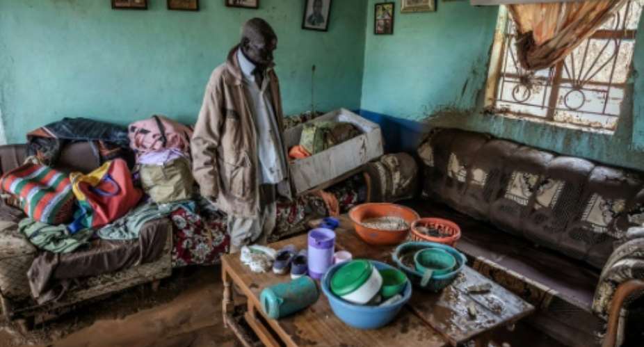 Mwangi and his wife were fast asleep when the disaster struck.  By LUIS TATO AFP