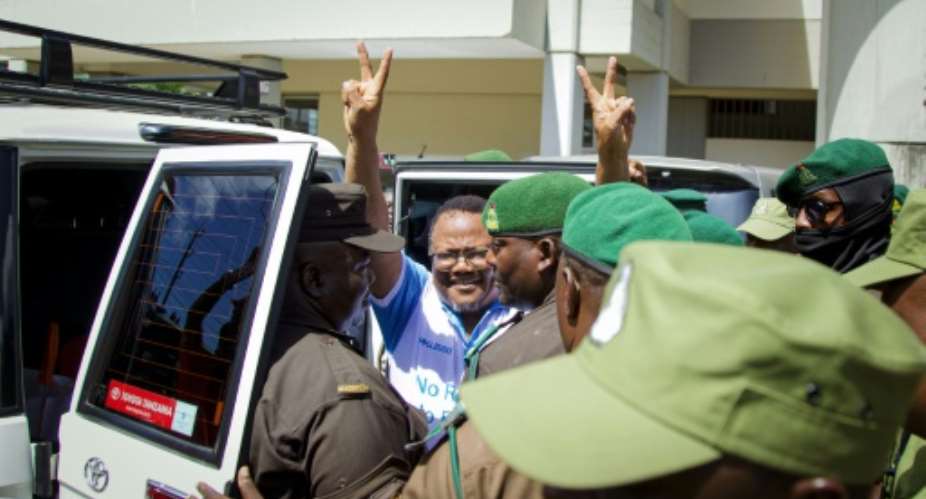 Mwangi had travelled to Dar es Salaam to show solidarity with arrested opposition leader Tundu Lissu (centre).  By ERICKY BONIPHACE (AFP)