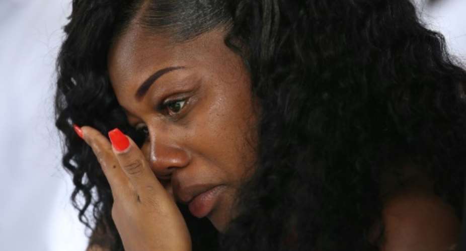 Myeshia Johnson, the widow of Sergeant La David Johnson, shown here at his funeral, says President Donald Trump struggled to remember her husband's name during a condolence call.  By JOE RAEDLE GETTY IMAGES NORTH AMERICAAFPFile