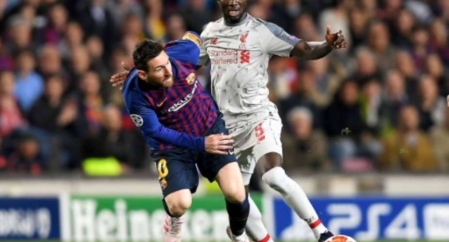 Naby Keita was hurt during the first leg of Liverpool's Champions League semi-final against Barcelona.  By JOSE JORDAN AFP