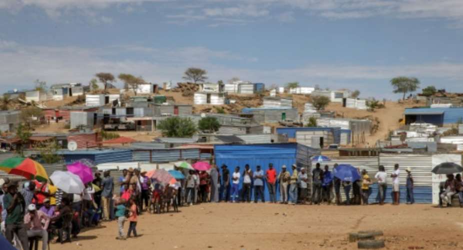 Namibians formed long lines to vote in the presidential and parliamentary elections.  By GIANLUIGI GUERCIA AFP