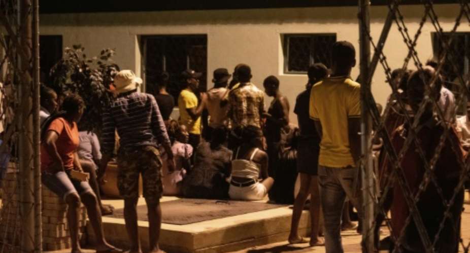 Namibians queued for hours in a painfully sluggish voting process which saw polling stations remain open late into the night.  By HILDEGARD TITUS AFP