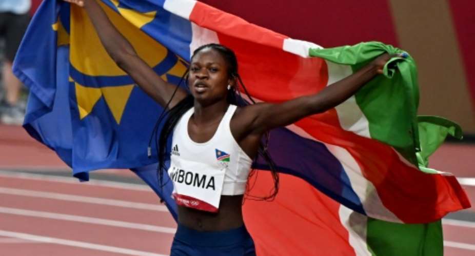 Namibia's Christine Mboma celebrates after winning silver in the women's 200m final at the Tokyo Olympics.  By Luis ACOSTA AFP
